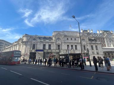 Long queues at bus and taxi stops in London